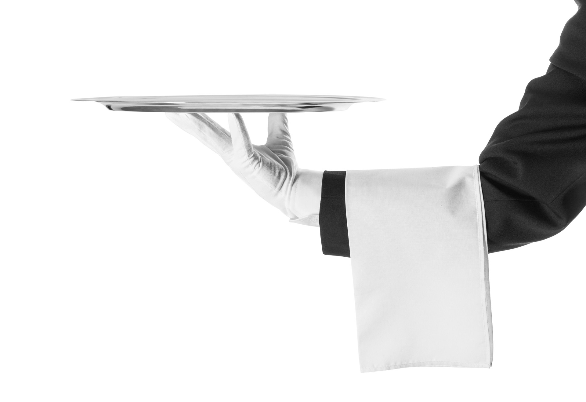 A black and white photo of a waiter holding a platter